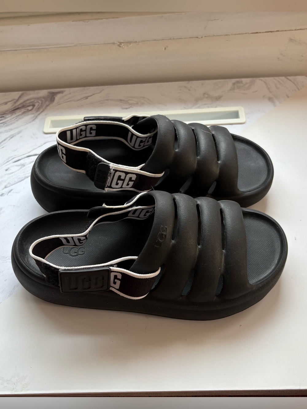 UGG Women’s Black Puffer Slides